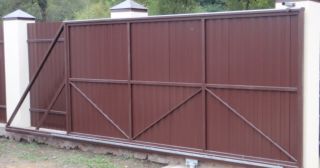 Купить откатные ворота из профнастила Нижнеудинск, цена от 1739 руб.