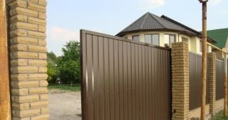 Купить откатные ворота из профнастила Нижнеудинск, цена от 1739 руб.